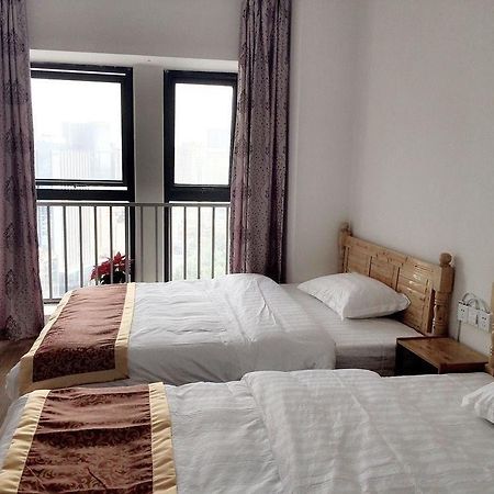Neighbor Home Apartment Hotel Chengdu Bagian luar foto